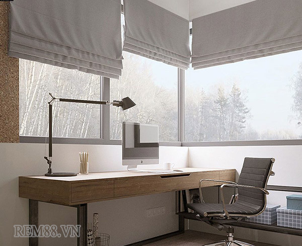 rèm roman cũng được sử dụng rất nhiều tại phòng làm việc để tạo một không gian với không khí dịu mát, êm ái, nhẹ nhàng